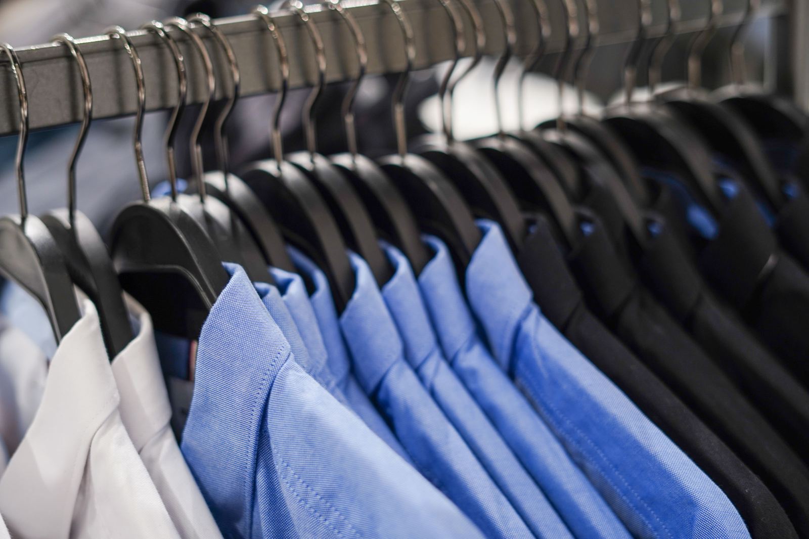 Pressed dress shirts on hangers